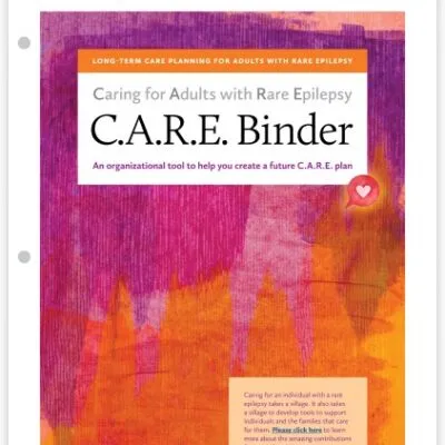 Orange and pink cover of the C.A.R.E. Binder